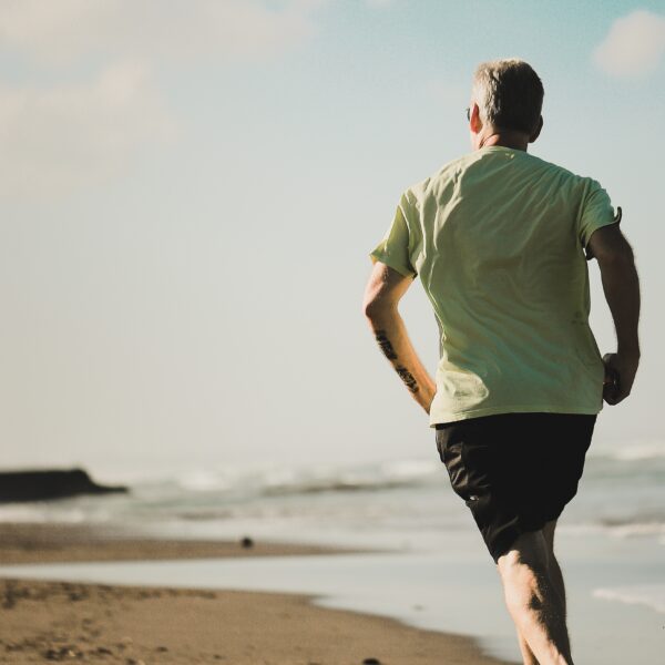 Man running on a beach